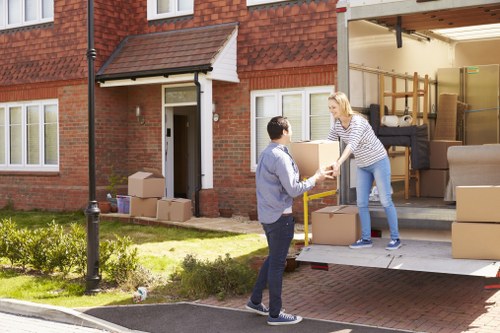 Man and van loading furniture for a local move in Hadley Wood
