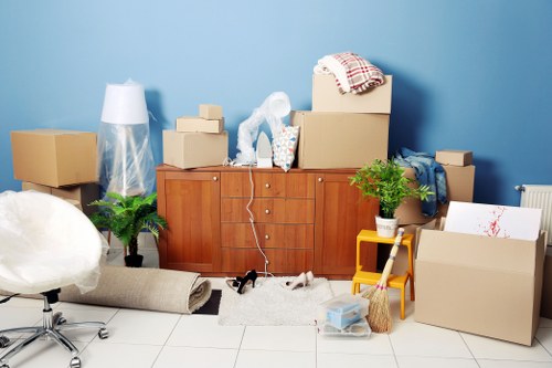 Business relocation planning in Hadley Wood with office furniture and moving boxes