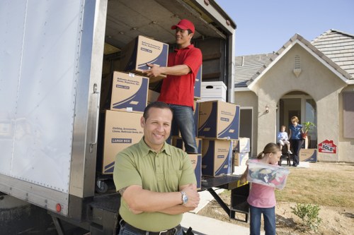 Loading furniture into a van for a Hadley Wood home delivery