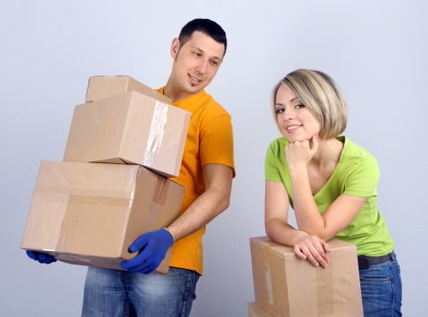 Loading furniture into a removal truck for a local move