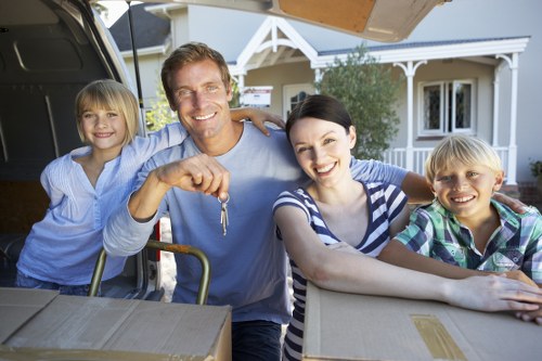 Unpacking service helping a family settle into a new home