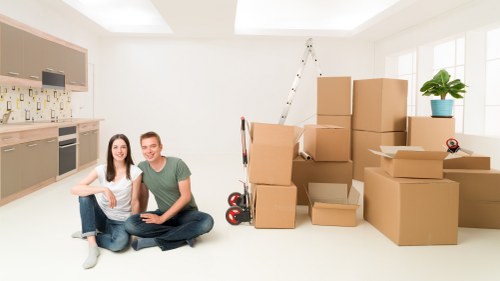Local moving team handling furniture near Hadley Wood