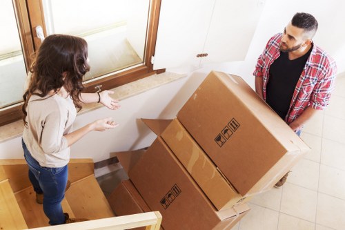 Business furniture and equipment being prepared for an office move