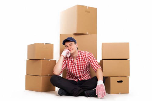 Local moving team organising boxes for a Hadley Wood property